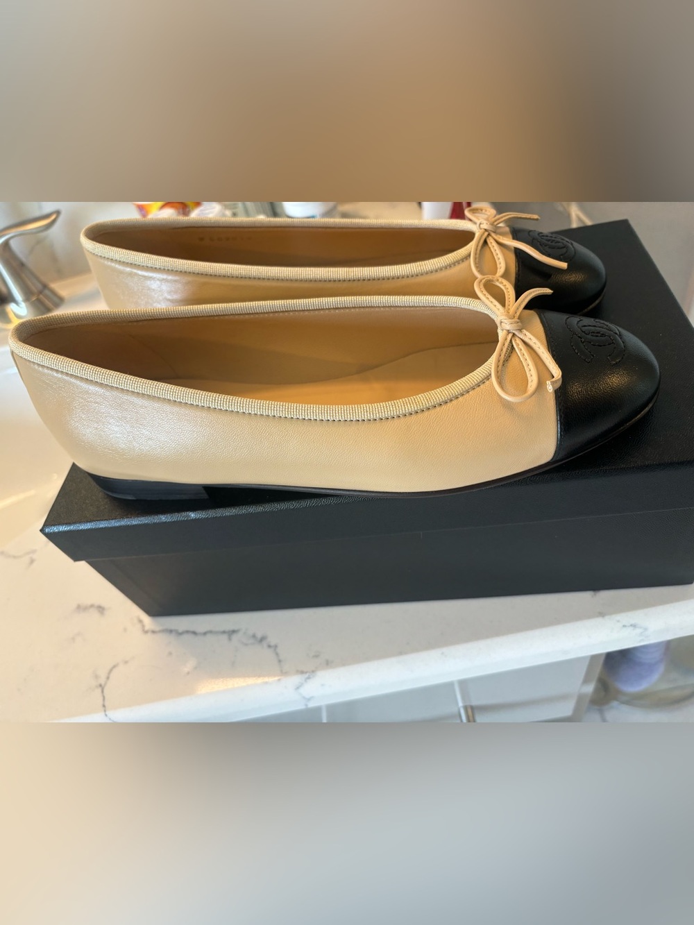CHANEL Beige Leather Ballet Flats with Black Cap Toe brand new never worn